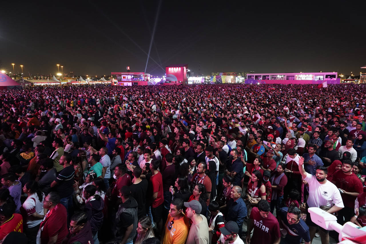Fans watch the group A soccer match between Qatar and Ecuador in Doha, Qatar, Sunday, Nov. 20, 2022...