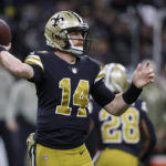 Dalton thrives, Stafford leaves, as Saints top Rams 27-20