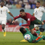 AP PHOTOS: World Cup highlights from Day 5