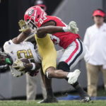 No. 1 Georgia overcomes slow start, routs Georgia Tech 37-14