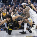 Stephen Curry scores 33 points as Warriors beat Jazz 129-118