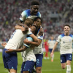 AP PHOTOS: World Cup highlights from Day 2