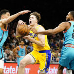 Suns hold on to win 115-105, Lakers' Beverley ejected