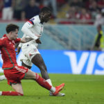 AP PHOTOS: World Cup highlights from Day 2