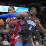 Gilgeous-Alexander stars as Thunder beat Bulls 123-119 in OT