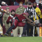 South Carolina runs over No. 5 Tennessee 63-38; Hooker hurt
