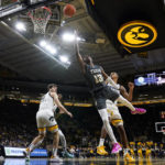Murray has career night: 31 points, 20 rebounds in Iowa win