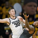 Murray has career night: 31 points, 20 rebounds in Iowa win