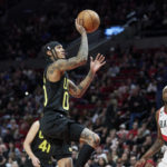 Jazz beat Blazers 118-113 to take Western Conference lead