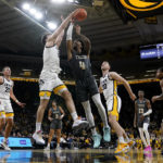Murray has career night: 31 points, 20 rebounds in Iowa win