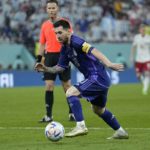 Messi and Argentina advance at World Cup, beat Poland 2-0