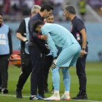 Iran goalkeeper clashes heads with teammate at World Cup