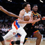 Ayton, Booker lead Suns to 108-102 win over Pistons
