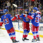 Oilers score 4 times in third period to defeat Rangers