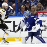 Bergeron gets 1,000th point, streaking Bruins beat Lightning