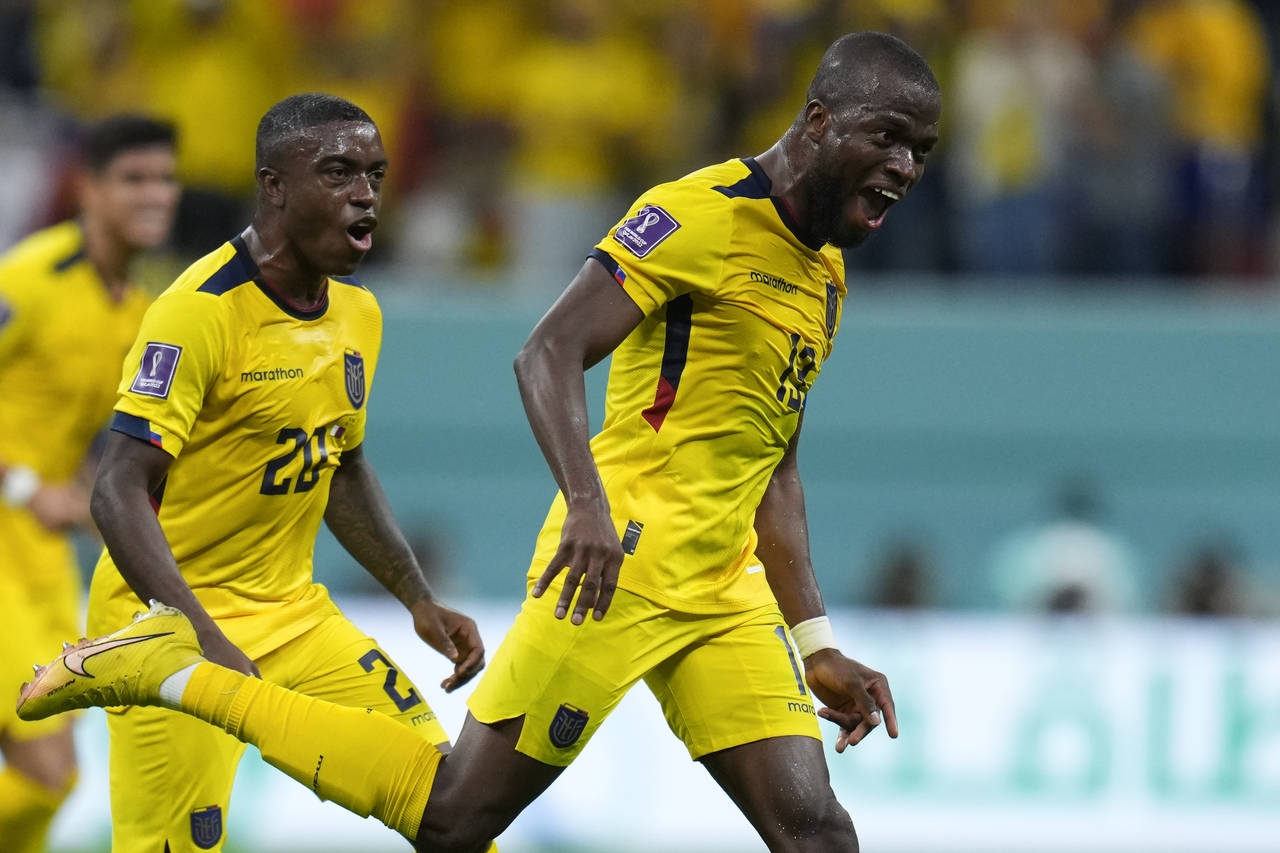Ecuador's Enner Valencia celebrates scoring his side's second goal against Qatar during a World Cup...