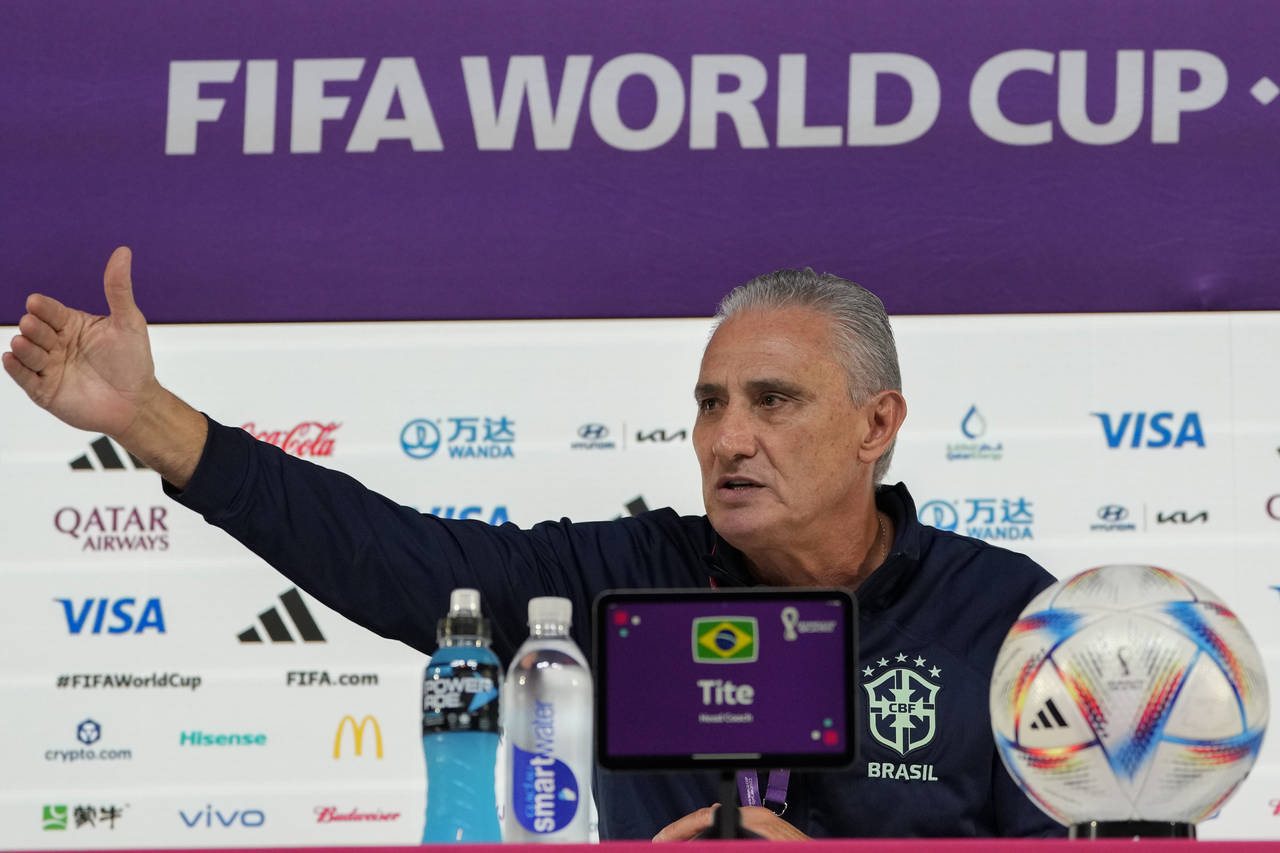 Brazil's head coach Tite speaks during a press conference on the eve of the group G of World Cup so...