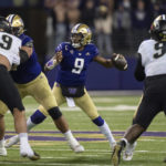 
              Washington quarterback Michael Penix Jr. prepares to throw a pass during the first half of the team's NCAA college football game against Colorado, Saturday, Nov. 19, 2022, in Seattle. (AP Photo/Stephen Brashear)
            