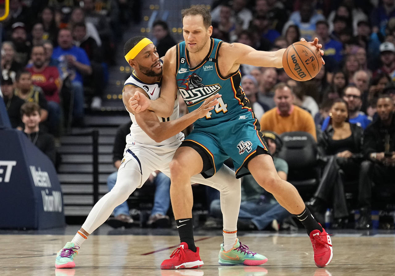 Denver Nuggets forward Bruce Brown pressures Detroit Pistons forward Bojan Bogdanovic. during the t...