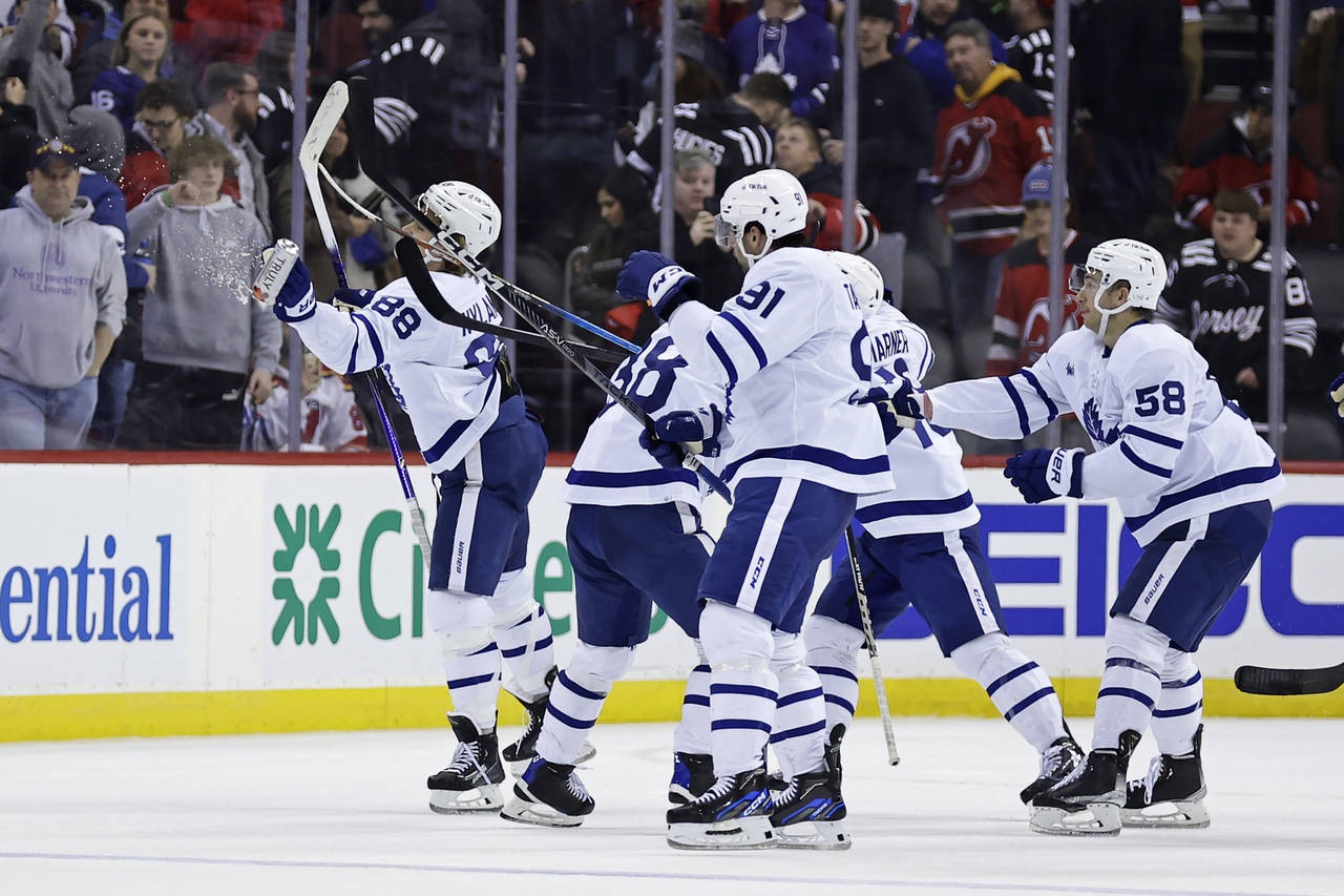 Toronto Maple Leafs right wing William Nylander (88) knocks down a canned beverage thrown by a spec...