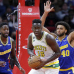 Thompson nets 10 3s, has 41 points in Warriors' 1st road win