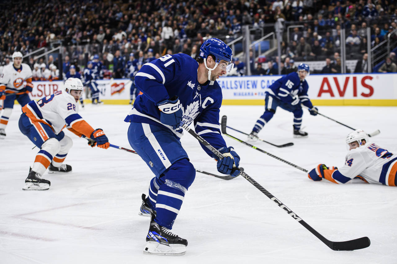 Toronto Maple Leafs center John Tavares (91) attacks the net during second period of an NHL hockey ...