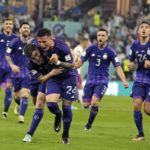 Messi and Argentina advance at World Cup, beat Poland 2-0
