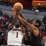 Scott scores 18, No. 22 Maryland blows out Louisville 79-54