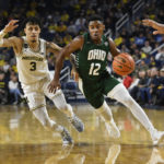 Dickinson leads No. 20 Michigan past Ohio 70-66 in OT