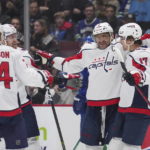 Ovechkin tops Gretzky for most road goals, Caps beat Canucks