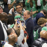 Tatum scores 49, Celtics hold off hot-shooting Heat 134-121