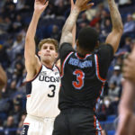 Sanogo leads unbeaten UConn past Delaware State 95-60