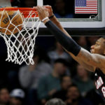 Towns scores 25, Wolves hold on against Heat for 105-101 win