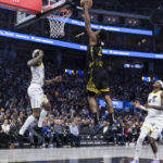 Stephen Curry scores 33 points as Warriors beat Jazz 129-118