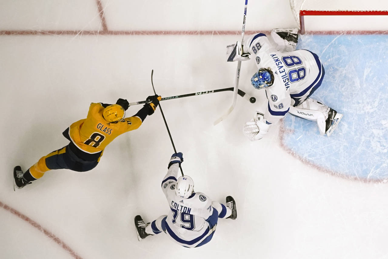 Tampa Bay Lightning goaltender Andrei Vasilevskiy (88) blocks the puck as Nashville Predators' Cody...