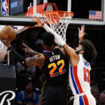Ayton, Booker lead Suns to 108-102 win over Pistons