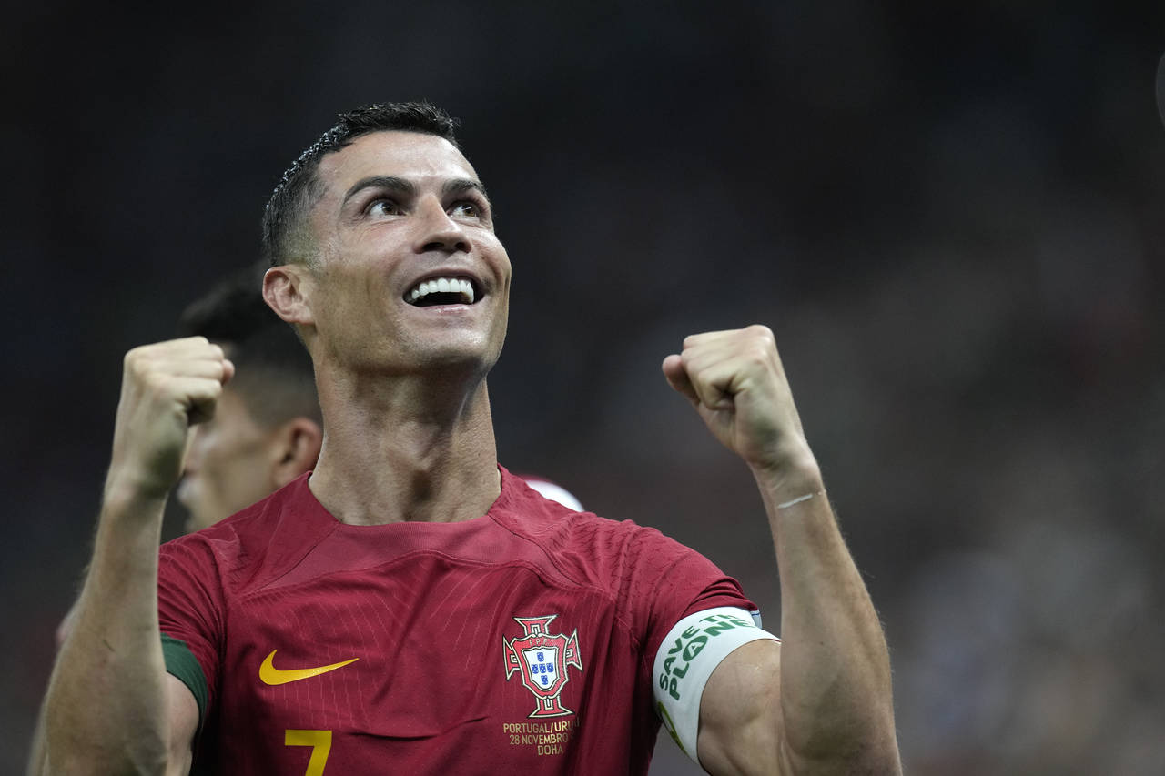 Portugal's Cristiano Ronaldo celebrates his side's opening goal during the World Cup group H soccer...
