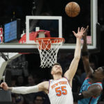 Payne, Booker lead Suns to 116-95 win over Knicks