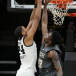 Murray has career night: 31 points, 20 rebounds in Iowa win