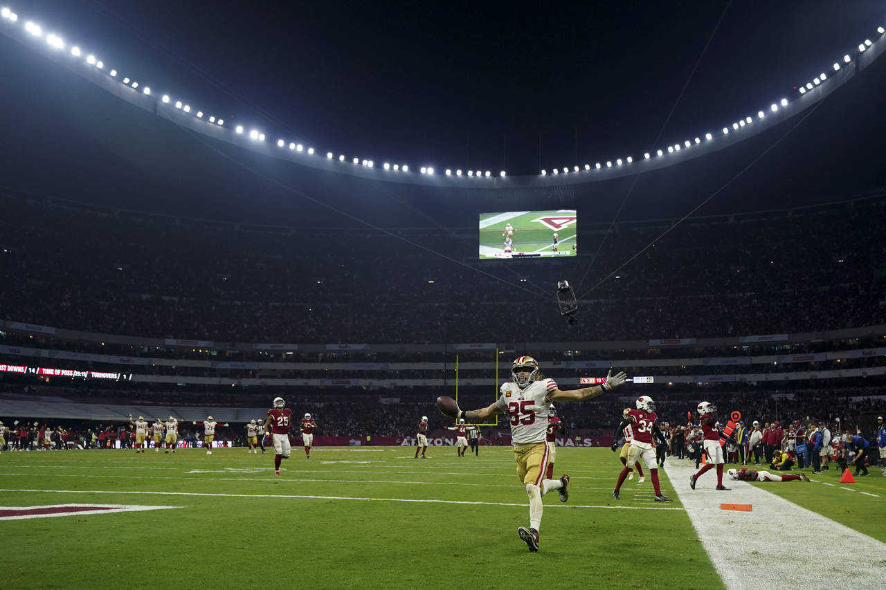 San Francisco 49ers tight end George Kittle celebrates after scoring a touchdown during the second ...