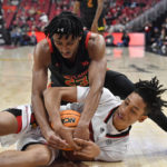 Scott scores 18, No. 22 Maryland blows out Louisville 79-54