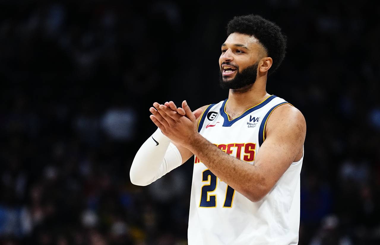 Denver Nuggets guard Jamal Murray gestures to teammates during the first quarter of the team's NBA ...