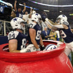 Cowboys TEs play live 'Whac-A-Mole' to celebrate vs. Giants