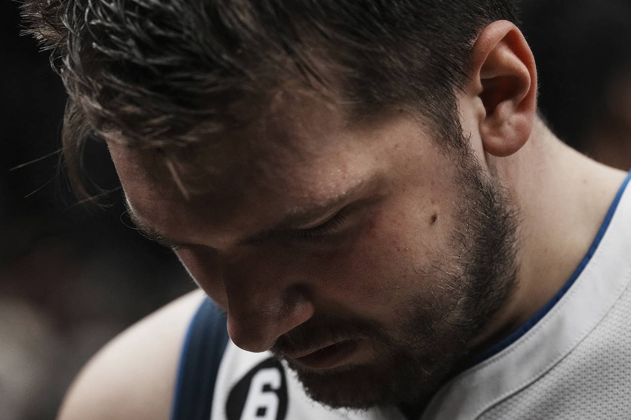 Dallas Mavericks guard Luka Doncic reacts as he walks off the court after his team's loss to the To...