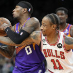 Devin Booker scores 51 points in 3 quarters, Suns rout Bulls