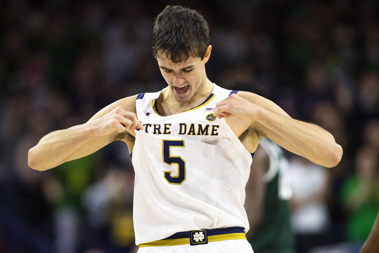 Notre Dame's Cormac Ryan celebrates during the first half of the team's NCAA college basketball gam...