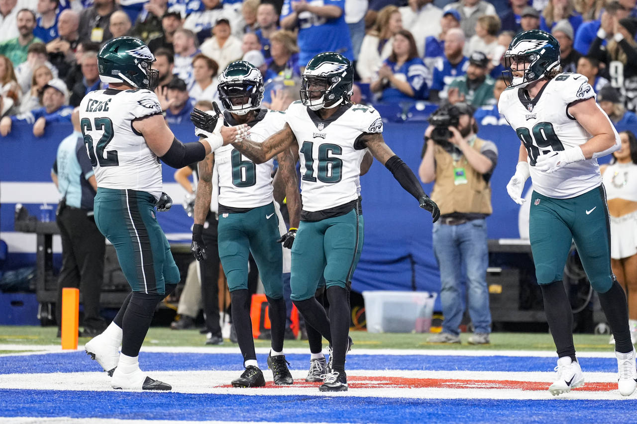 Philadelphia Eagles wide receiver Quez Watkins (16) celebrates after a touchdown against the Indian...