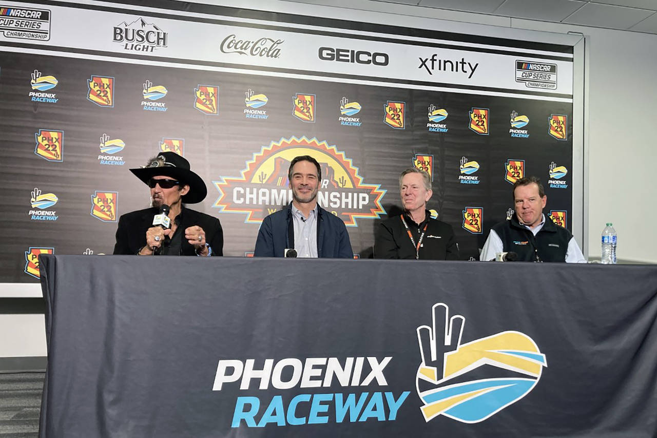 Richard Petty, Jimmie Johnson, Maury Gallagher, and Petty GMS team president Mike Beam, from left, ...