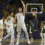 Dickinson leads No. 20 Michigan past Ohio 70-66 in OT