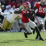 No. 1 Georgia overcomes slow start, routs Georgia Tech 37-14
